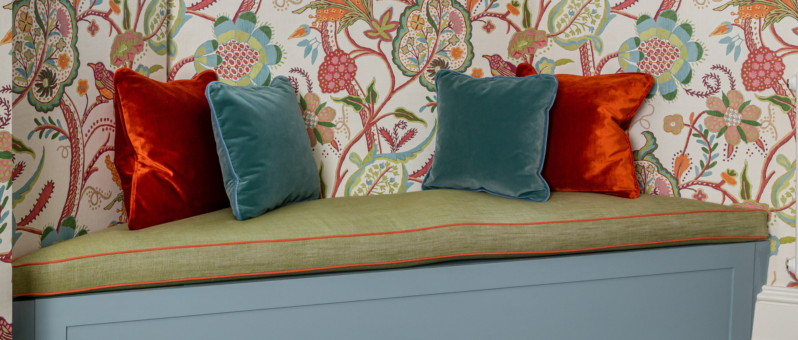 Wallpaper and banquette detail of a Chelsea renovated pied-a-terre